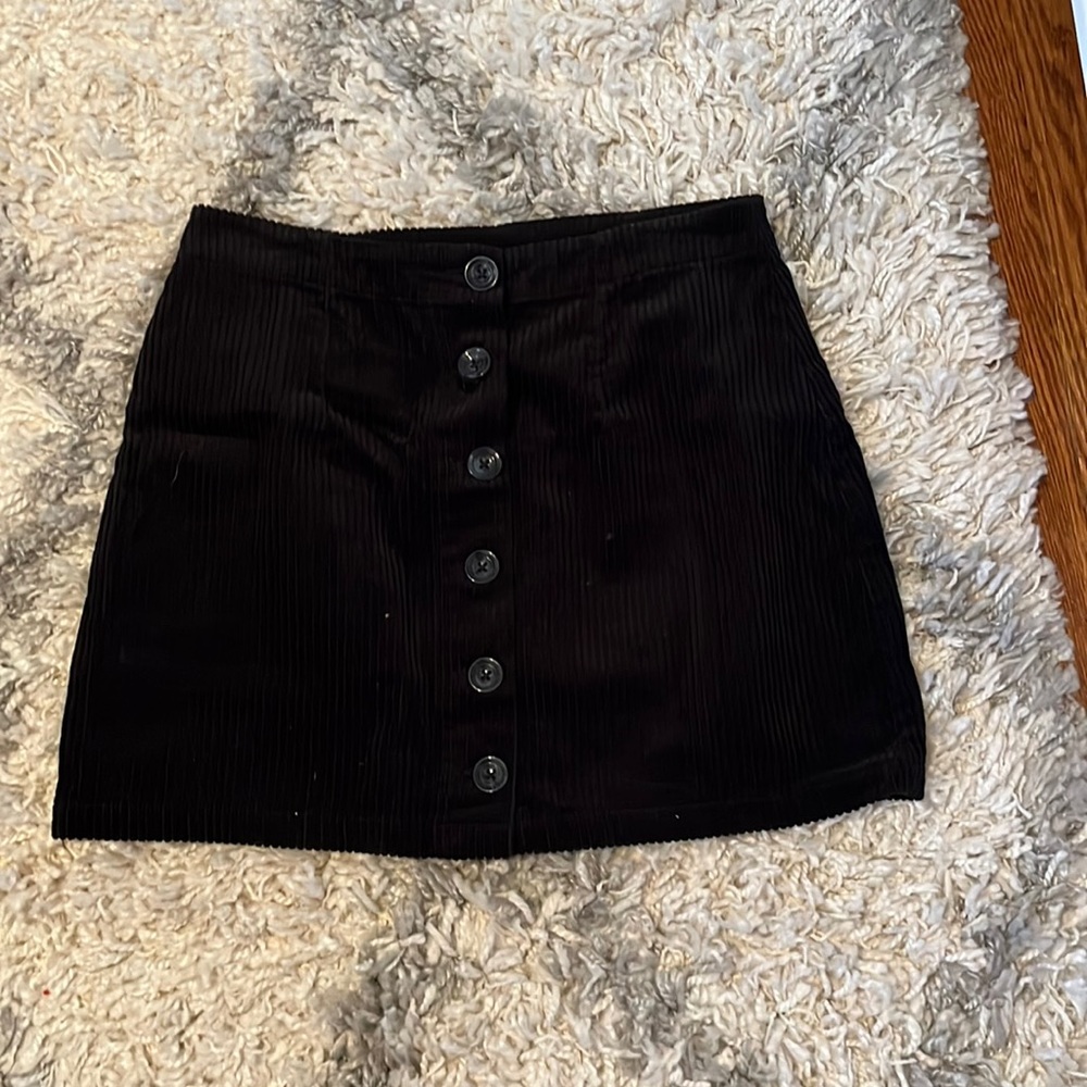 black corduroy mini skirt